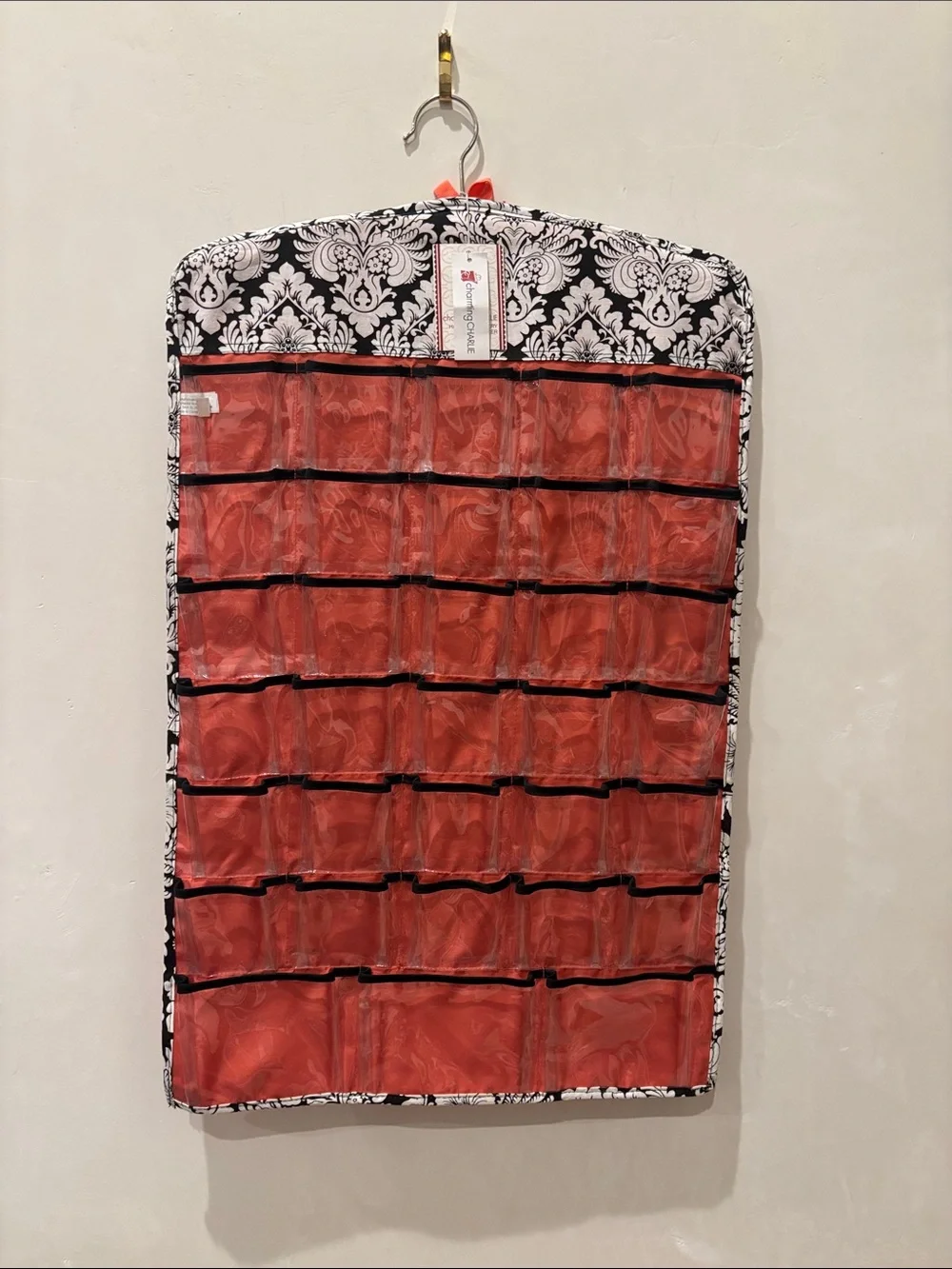 Charming Charlie 66-Pocket Hanging Organizer in Red and Black